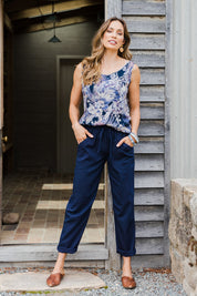 Model Amanda wearing size 10 of The Easy Wear Pant in colour Navy (Blue), from the front, showing the whole outfit