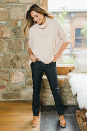 Model Amanda wearing size 10 of The 7/8 Pull On Jean in colour Blackdenim (Black), from the front, showing the whole outfit