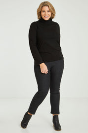 Model Fiona wearing size 16 of The 7/8 Pull On Jean in colour Blackdenim (Black), from the front, showing the whole outfit