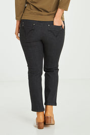 Model Laura wearing size 14 of The 7/8 Pull On Jean in colour Blackdenim (Black), from the back