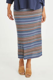 Model Noli wearing size 14 of The Striped Light Knit Lined Skirt in colour Bluestripe (Blue), from the front, cropped image