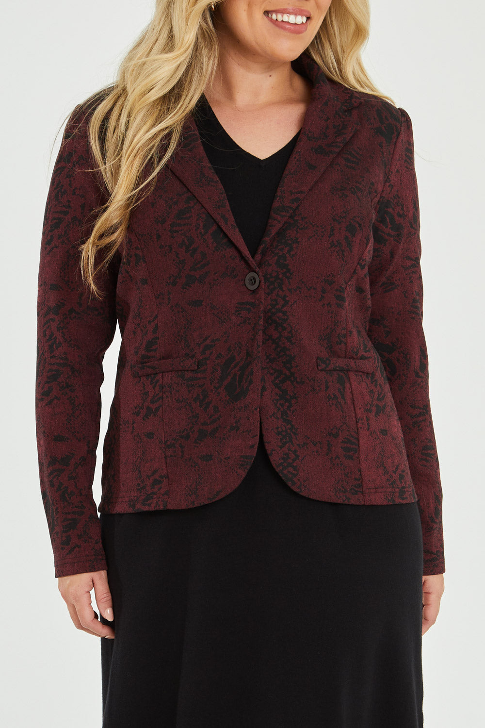 Model Katie wearing size 16 of The Jacquard Ponti Jacket in colour Burgundy (Red), from the front, cropped image
