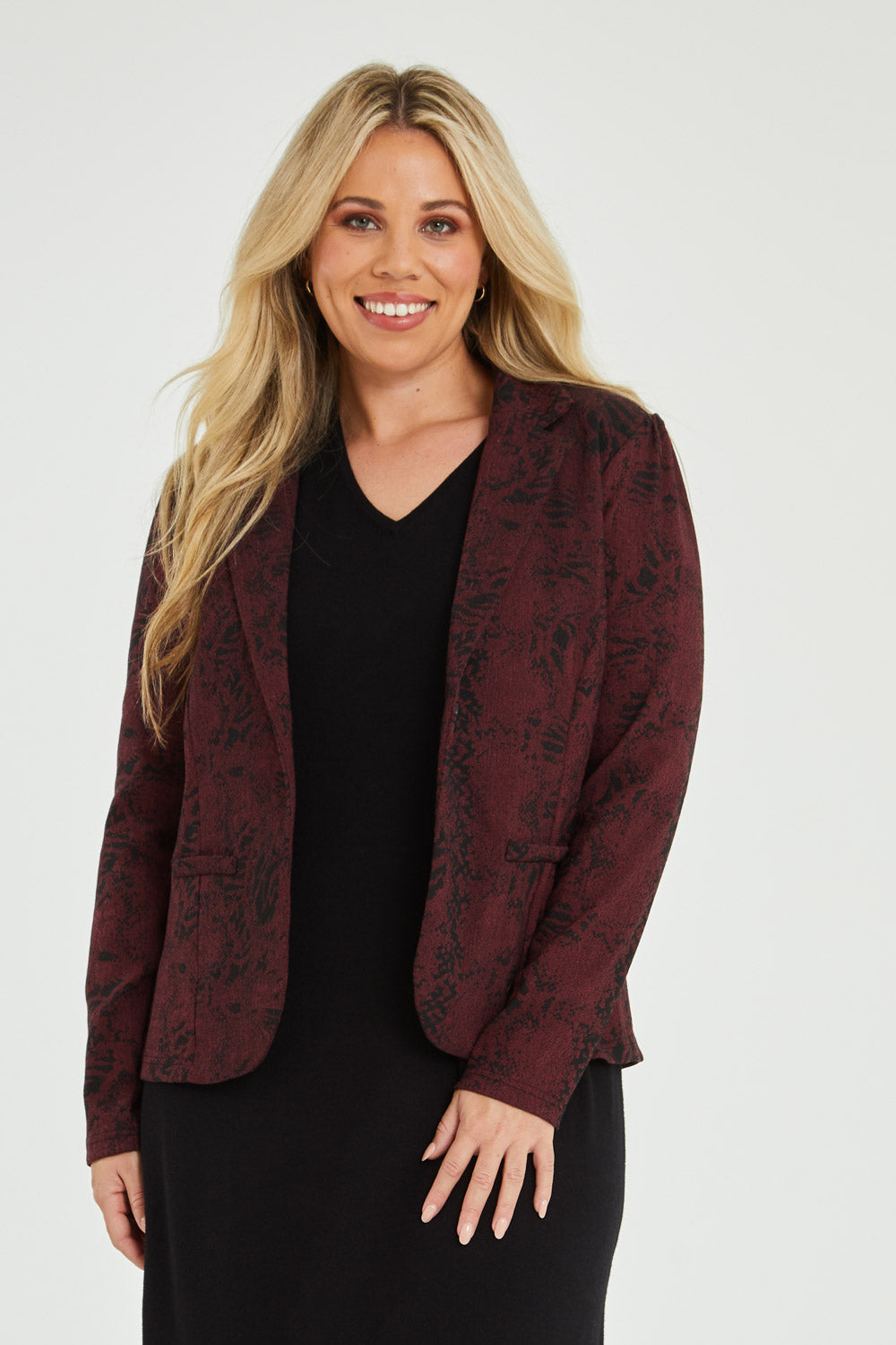 Model Katie wearing size 16 of The Jacquard Ponti Jacket in colour Burgundy (Red), from the front, cropped image