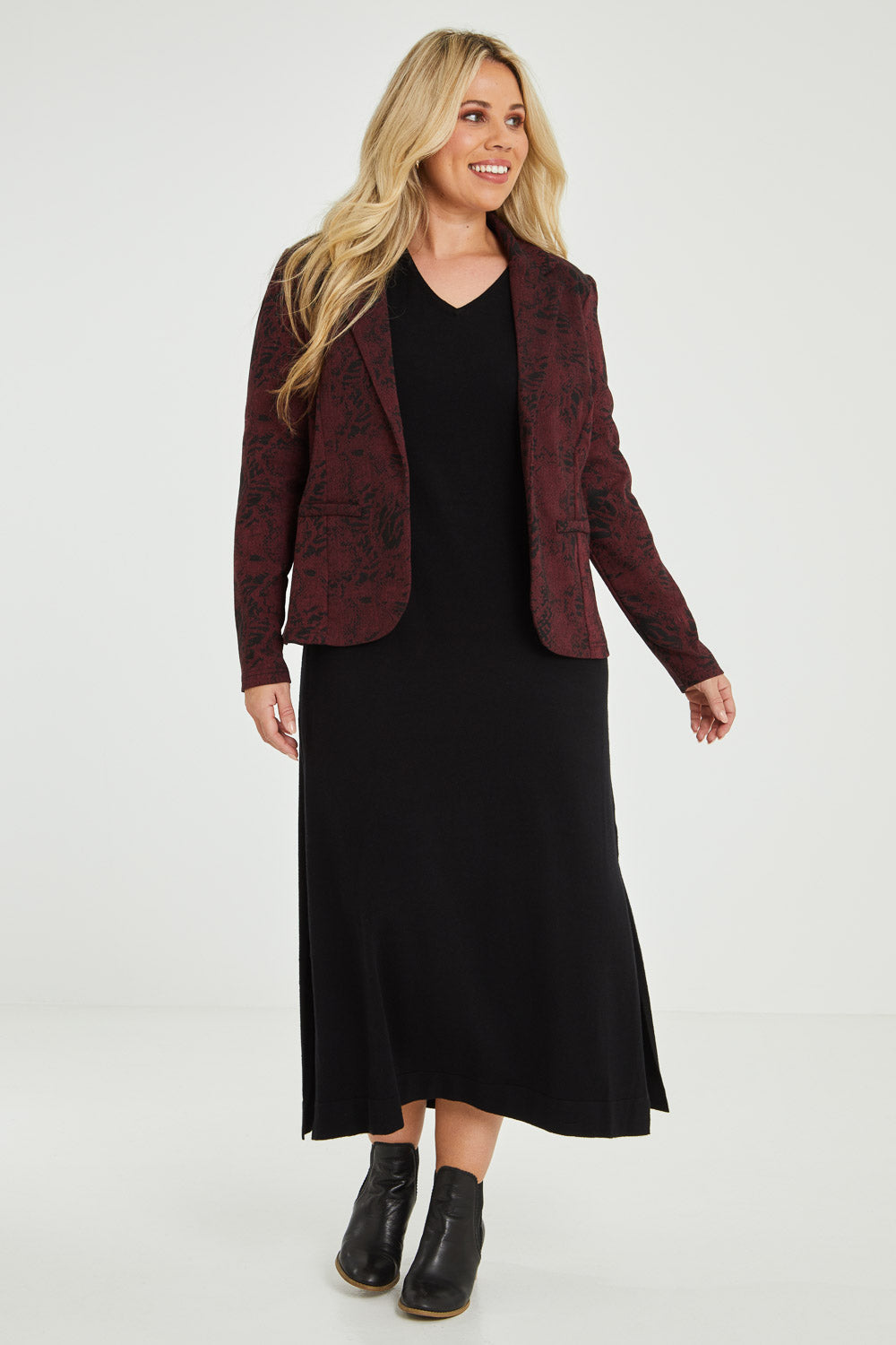 Model Katie wearing size 16 of The Jacquard Ponti Jacket in colour Burgundy (Red), from the front, showing the whole outfit