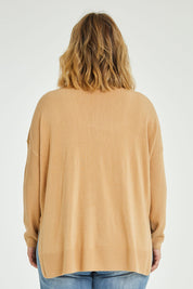 Model Jess wearing size L of The Essential Soft High Low Jumper in colour Camel, from the back