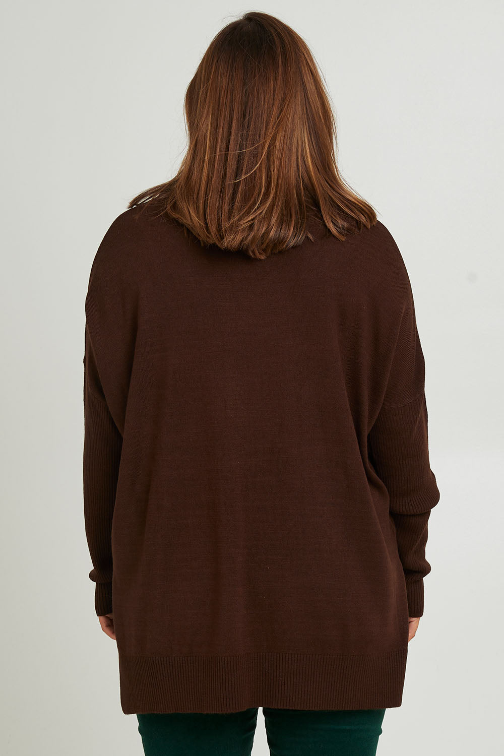 Model Monique wearing size L of The Essential Soft High Low Jumper in colour Chocolate, from the back
