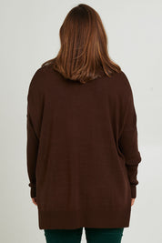Model Monique wearing size L of The Essential Soft High Low Jumper in colour Chocolate, from the back