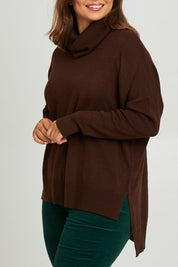 Model Monique wearing size L of The Essential Soft High Low Jumper in colour Chocolate, from the front, cropped image
