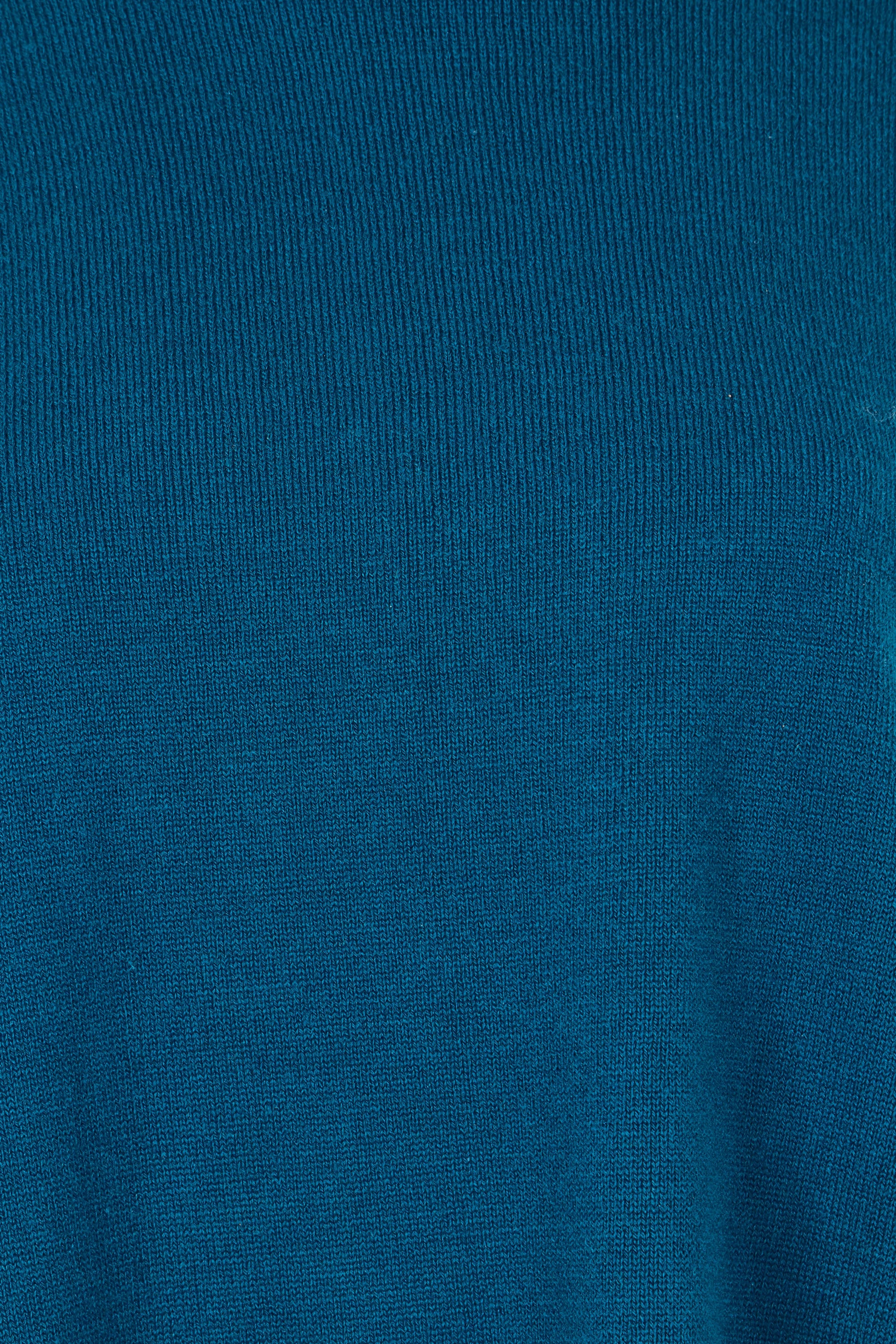 Product shot of The Essential Soft High Low Jumper in colour Petrol (Blue), detail