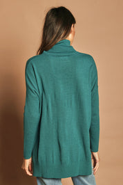 Model Madeline wearing size S of The Essential Soft High Low Jumper in colour Seagreen (Green), from the back
