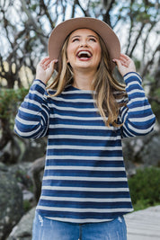 Model Tahlia wearing size 10 of The Multi Coloured Striped Tee in colour Denim (Blue), from the front, showing the whole outfit