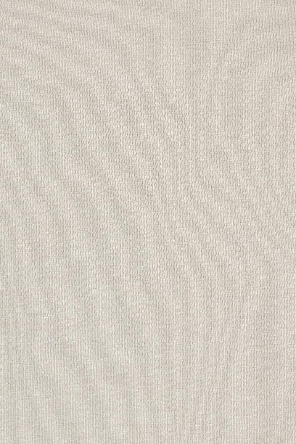 Product shot of The Keepers Tee in colour Latte, detail