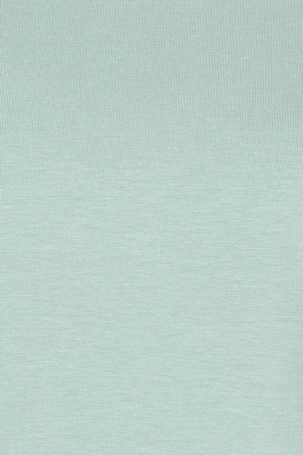 Product shot of The Keepers Tee in colour Sage (Green), detail