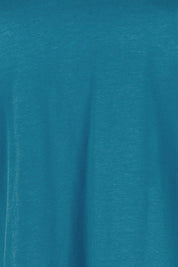 Product shot of the The Keepers Cotton Tee - Turquoise in colour Turquoise, showing detail