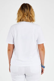 Model Jess wearing size 14 of The Keepers Tee in colour White (White), from the back