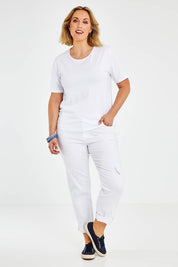 Model Jess wearing size 14 of The Keepers Tee in colour White (White), from the front, showing the whole outfit