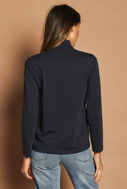 Model Madeline wearing size 10 of The Keepers Skivvy in colour Darknavy (Blue), from the back