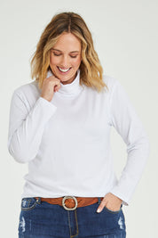 Model Jess wearing size 14 of The Keepers Skivvy in colour White (White), from the front, cropped image