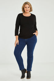 Model Fiona wearing size 16 of The Keepers 3/4 Sleeve Tee in colour Black (Black), from the front, showing the whole outfit