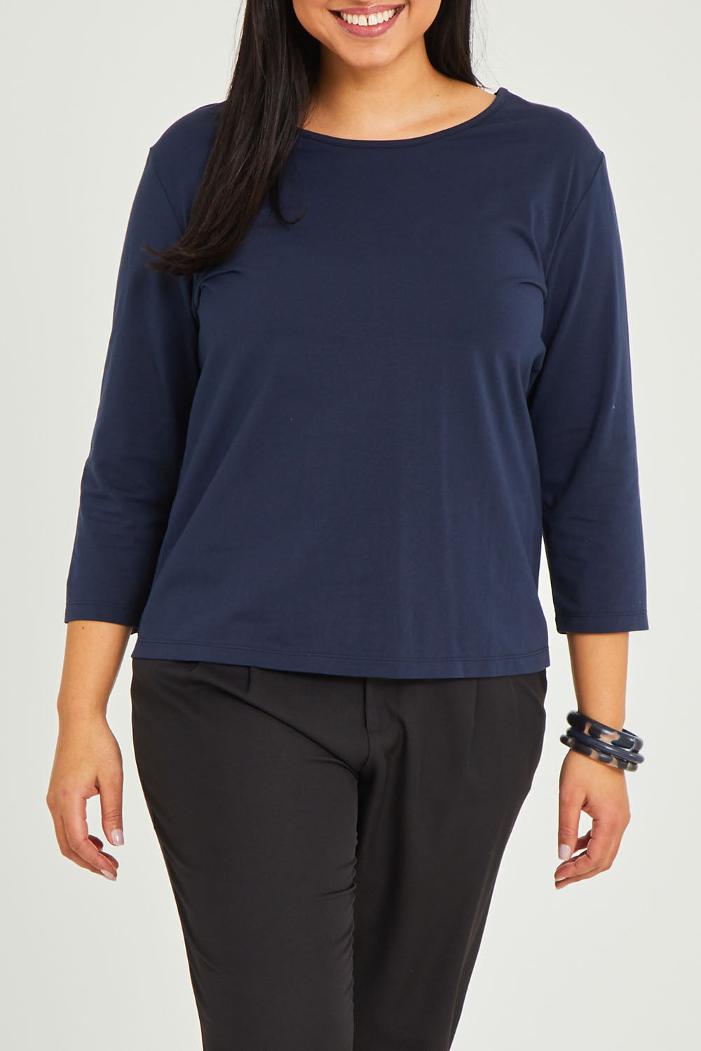 Model Terri-Leigh wearing size 14 of The Keepers 3/4 Sleeve Tee in colour Darknavy (Blue), from the front, cropped image