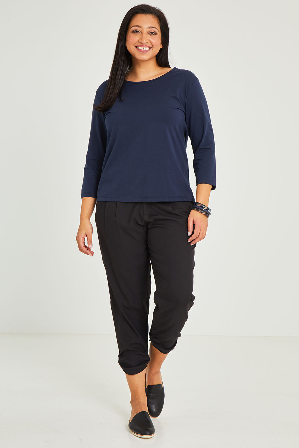 Model Terri-Leigh wearing size 14 of The Keepers 3/4 Sleeve Tee in colour Darknavy (Blue), from the front, showing the whole outfit