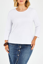 Model Jess wearing size 14 of The Keepers 3/4 Sleeve Tee in colour White (White), from the front, cropped image