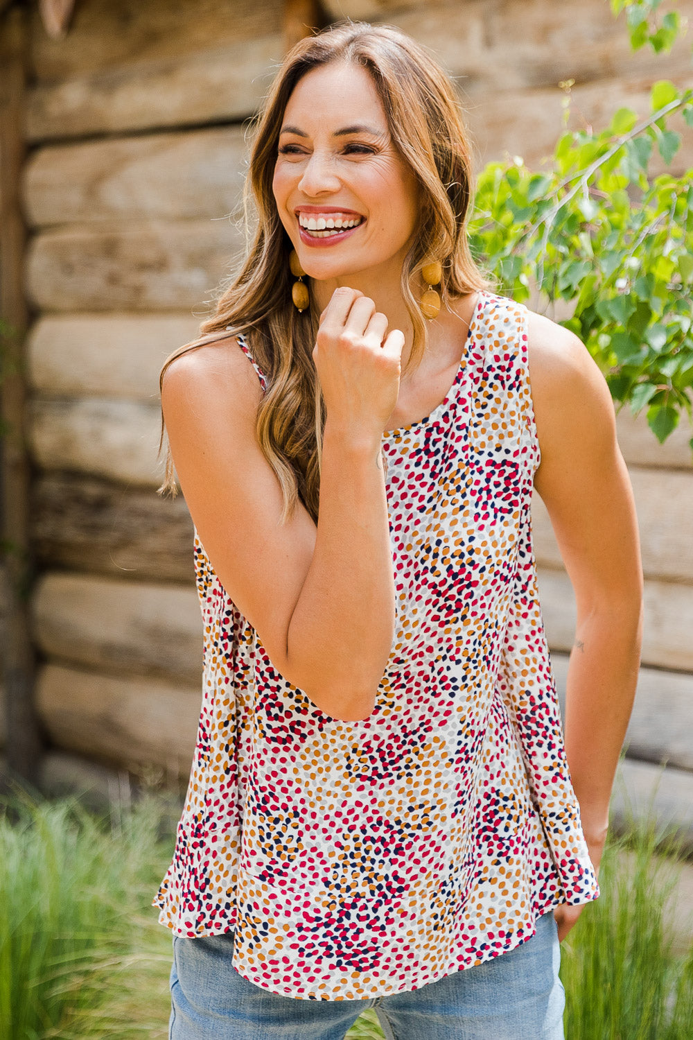 Model Amanda wearing size 10 of The Woven Swing Tank in colour Multispot (White), from the front, showing the whole outfit