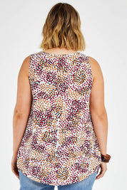 Model Jess wearing size 14 of The Woven Swing Tank in colour Multispot (White), from the back