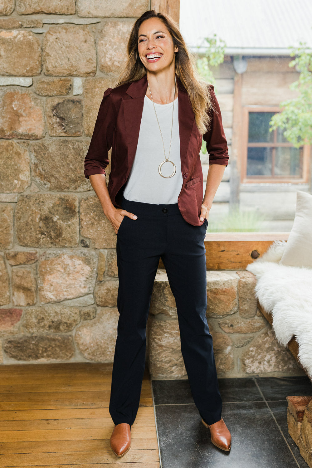 Model Amanda wearing size 10 of The Bengaline Everyday Pant in colour Navy (Blue), from the front, showing the whole outfit