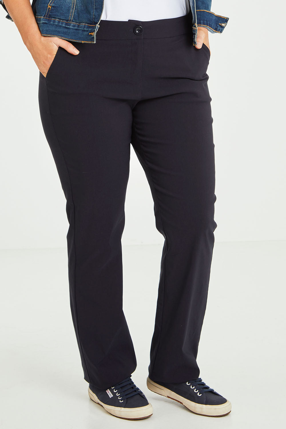 Model Laura wearing size 14 of The Bengaline Everyday Pant in colour Navy (Blue), from the front, cropped image