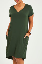 Model Noli wearing size 14 of The V Split Midi Tee Dress in colour Khaki (Green), from the front, cropped image