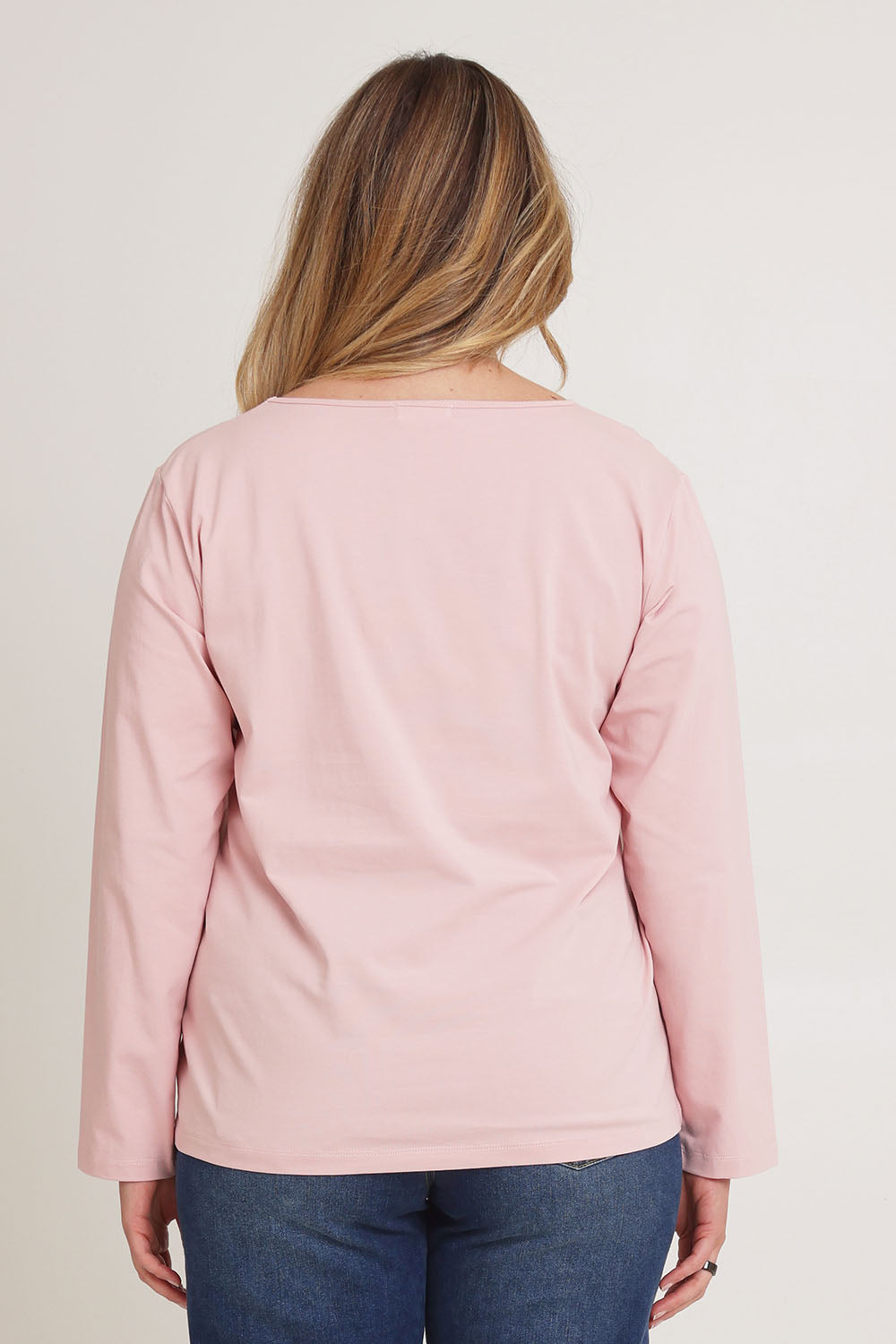 Model Chanel wearing size 16 of The Keepers Long Sleeve Tee in colour Softpink (Pink), from the back