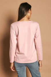 Model Madeline wearing size 10 of The Keepers Long Sleeve Tee in colour Softpink (Pink), from the back