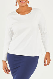 Model Noli wearing size 14 of The Keepers Long Sleeve Tee in colour White (White), from the front, cropped image
