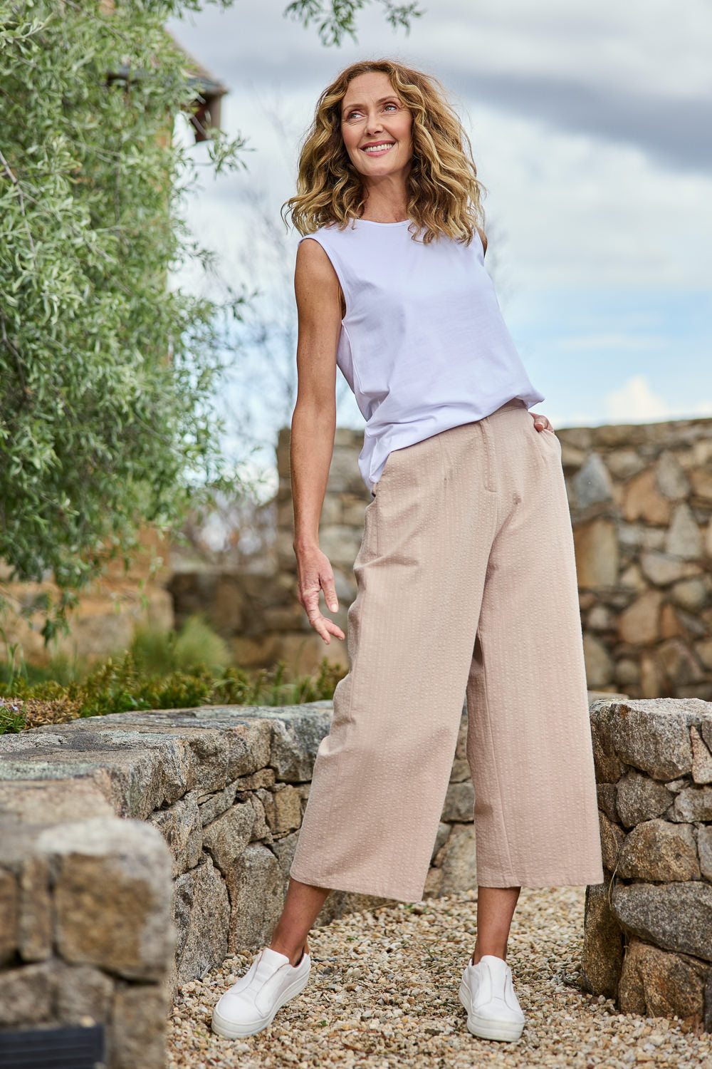 Model Emma wearing size 10 of The Striped Pull On Cullotte in colour Nougat, from the front, showing the whole outfit