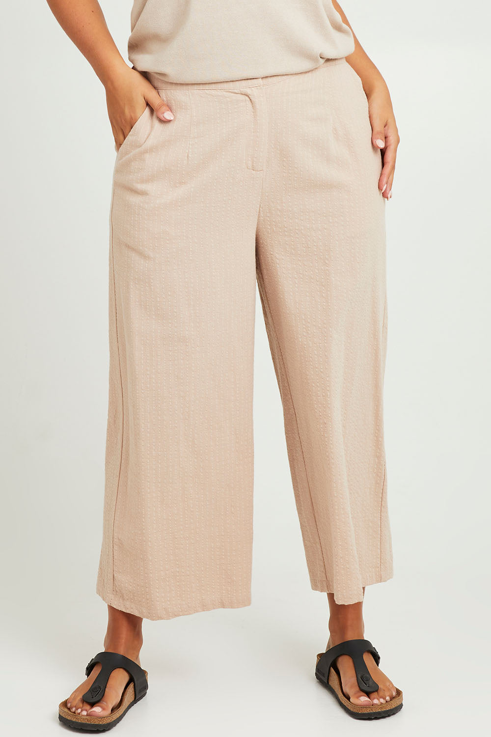 Model Monique wearing size 14 of The Striped Pull On Cullotte in colour Nougat, from the front, cropped image
