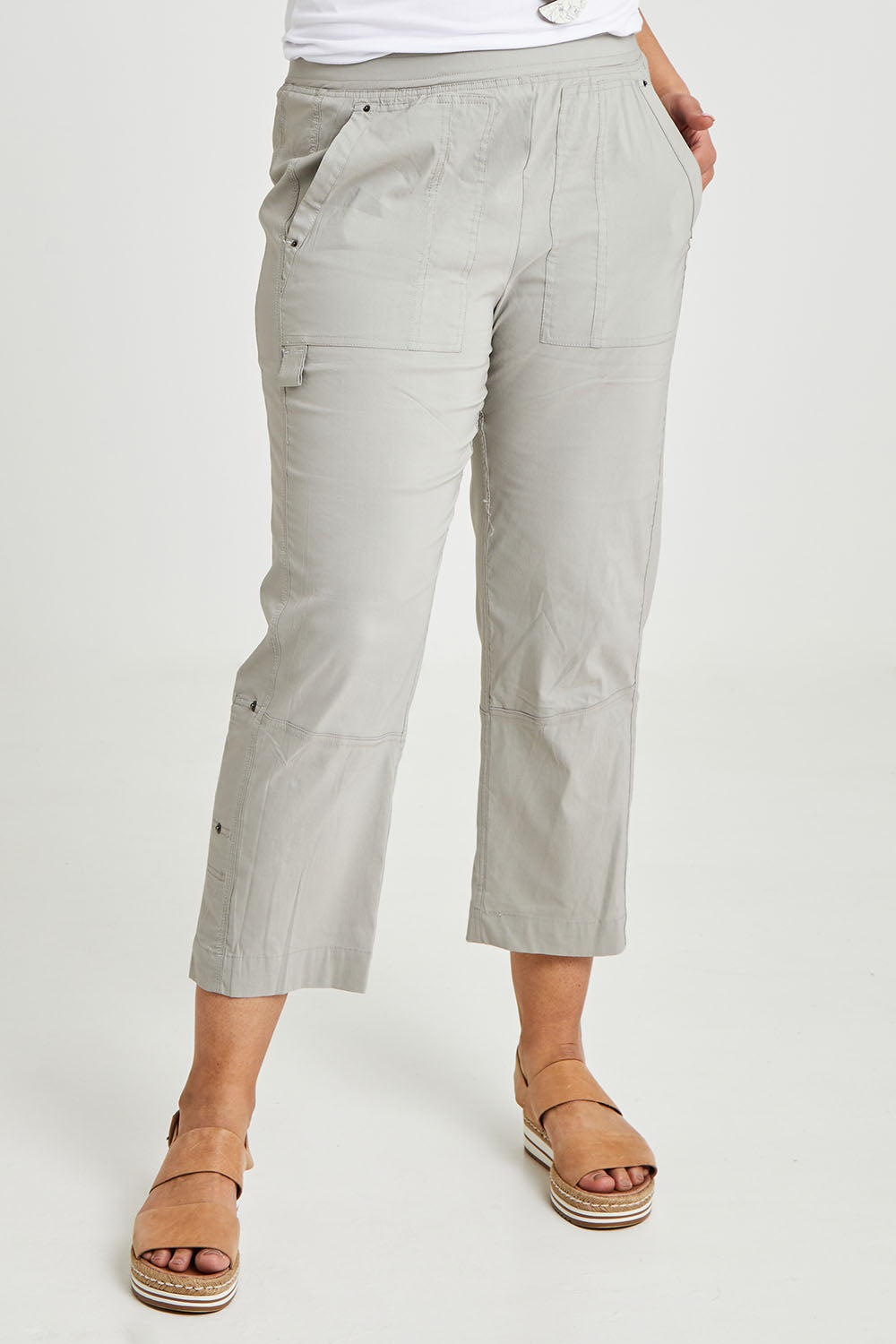 Model Terri-Leigh wearing size 14 of The Casual Pull On Summer Pant in colour Parchement (Grey), from the front, cropped image