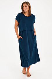 Model Monique wearing size 14 of The Layered Tee Dress in colour Blueocean (Blue), from the front, showing the whole outfit