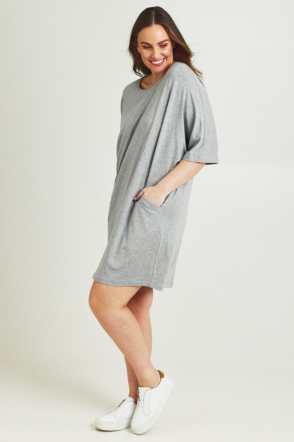 Model Jane wearing size 14 of The Everyday Tee Dress in colour Lightgrey (Grey), from the front, showing the whole outfit