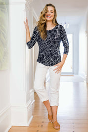 Model Tahlia wearing size 10 of The Ruched 3/4 Sleeve Tee in colour Navywhite (Blue), from the front, showing the whole outfit