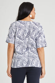 Model Terri-Leigh wearing size 14 of The Cotton Pocket Top in colour Whitenavy (White), from the back