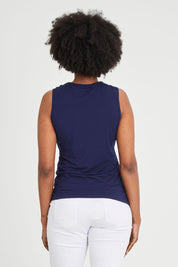 Model Aiyana wearing size 10 of The Classic Lace Trim Tank in colour Navy (Blue), from the back