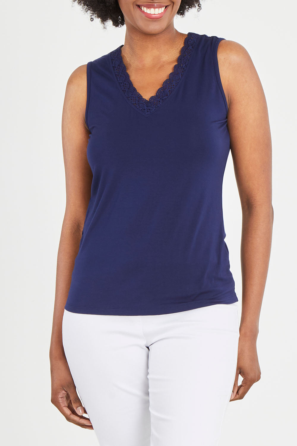 Model Aiyana wearing size 10 of The Classic Lace Trim Tank in colour Navy (Blue), from the front, cropped image