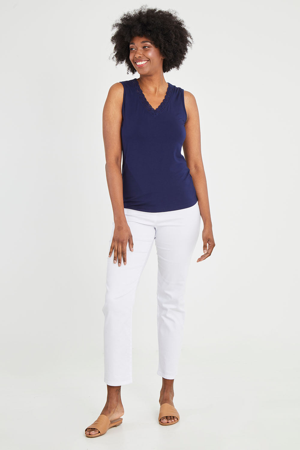 Model Aiyana wearing size 10 of The Classic Lace Trim Tank in colour Navy (Blue), from the front, showing the whole outfit