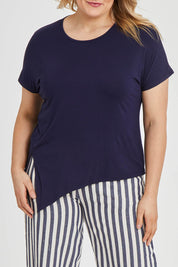 Model Keeara wearing size 16 of The Knot Detail Tee in colour Navy (Blue), from the front, cropped image