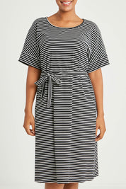 Model Noli wearing size 14 of The Striped Detail Dress in colour Blackwhite (Black), from the front, cropped image