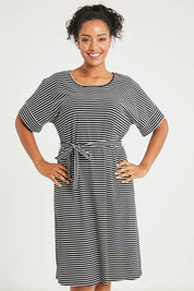 Model Noli wearing size 14 of The Striped Detail Dress in colour Blackwhite (Black), from the front, cropped image