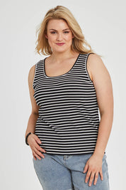 Model Keeara wearing size 16 of The Keepers Striped Rib Tank in colour Black (Black), from the front, cropped image