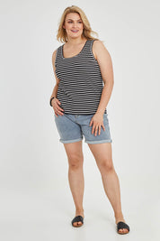 Model Keeara wearing size 16 of The Keepers Striped Rib Tank in colour Black (Black), from the front, showing the whole outfit