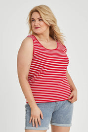 Model Keeara wearing size 16 of The Keepers Striped Rib Tank in colour Red (Red), from the front, cropped image